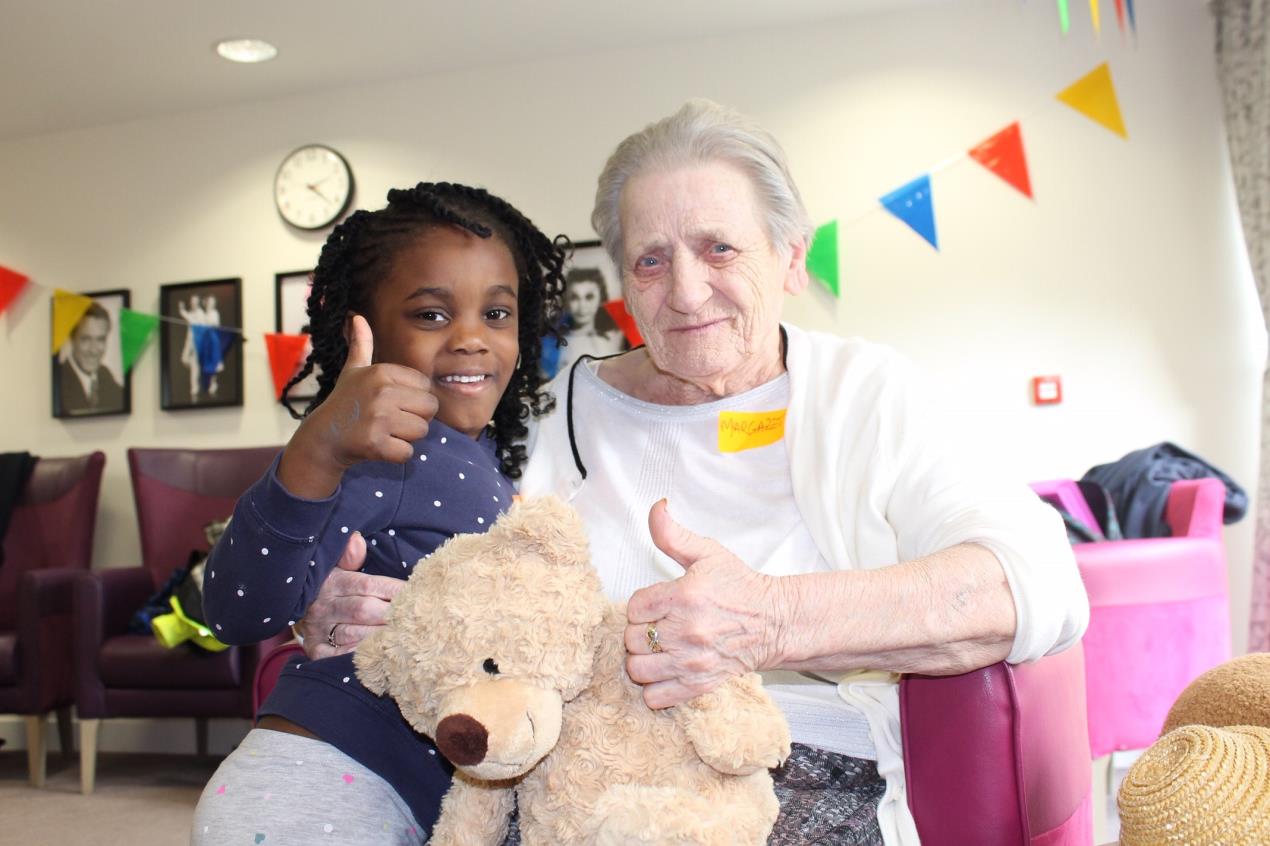 Nursery Pupils Bring Care Home Residents Joie de Vivre 10 Karen Onodjo aged 4 with Margaret McColl aged 81.
