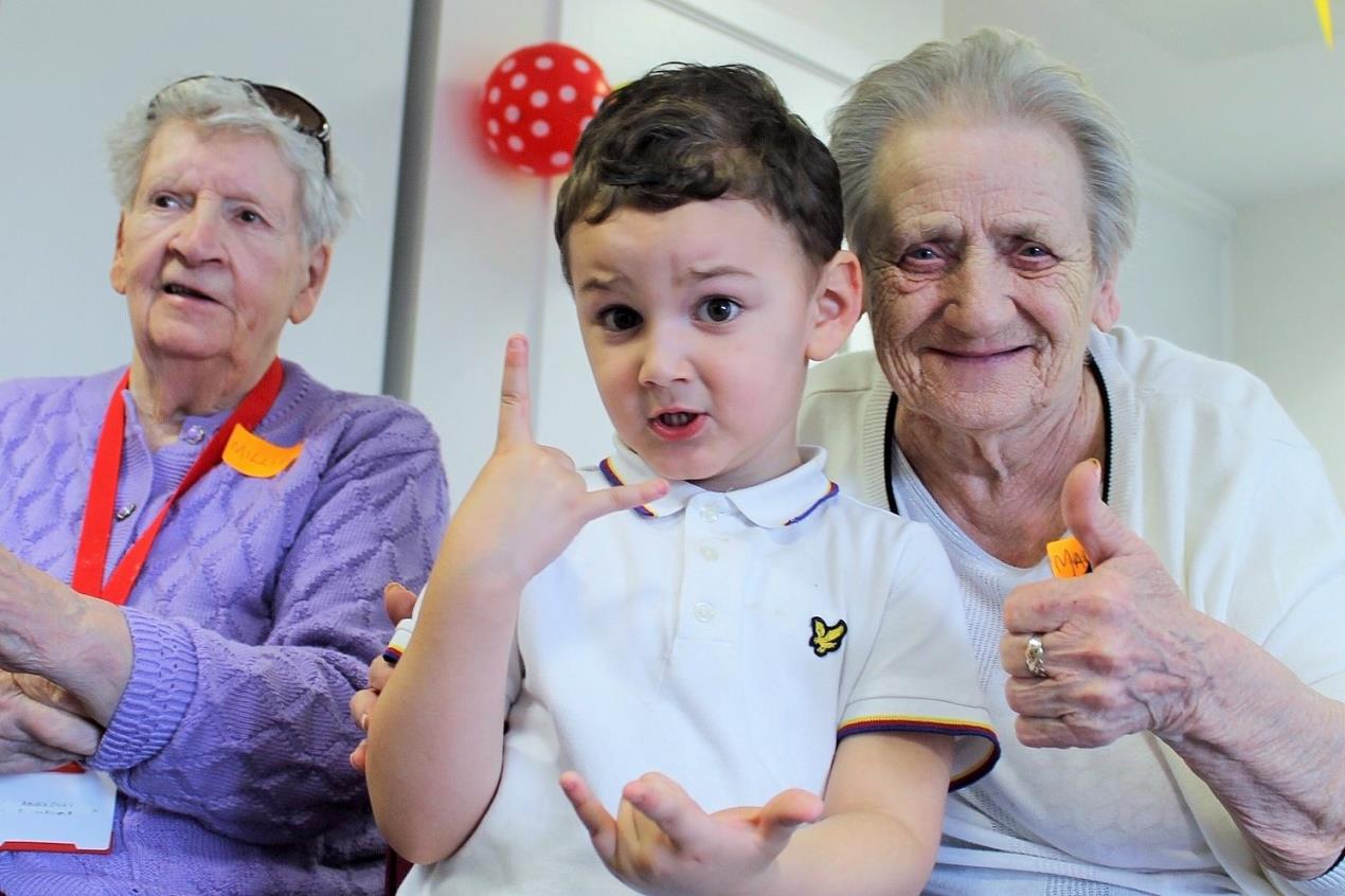 Nursery Pupils Bring Care Home Residents Joie de Vivre 9 Mark Kane aged 4 with Millie (left) and Margaret