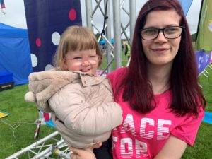 Race for Life Inverness VIP starter Shannon Murphy 22 with her daughter Sophia. Shannon rang the bell in memory of her husband Michael who died aged 25 from cancer scaled