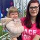 Race for Life Inverness VIP starter Shannon Murphy 22 with her daughter Sophia. Shannon rang the bell in memory of her husband Michael who died aged 25 from cancer scaled