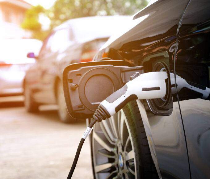 charging modern electric car battery scaled