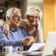 Happy mature couple using laptop