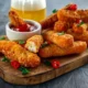 Crispy Halloumi cheese sticks Fries with Chili sauce for dipping and glass of cold beer