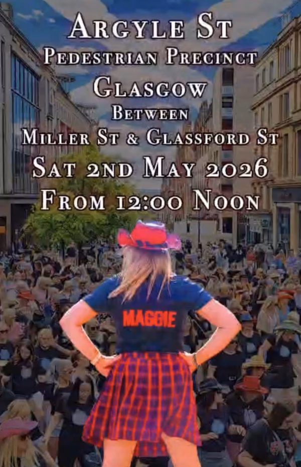 A woman in a red hat and tartan skirt, with “Maggie” on her shirt, stands facing a large crowd on a city street. Event details above read: Argyle St, Glasgow, Sat 2nd May 2026, from 12:00 midday.