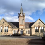 Bishopbriggs Library and Community Hub, a sandstone building with a clock tower