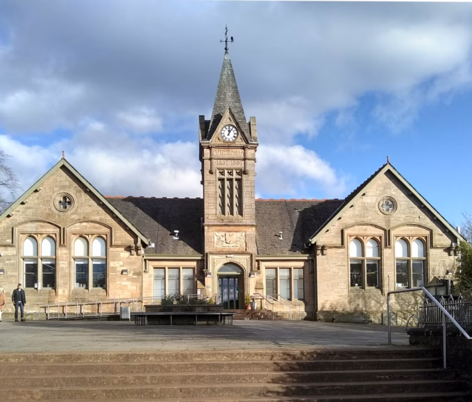 Bishopbriggs Library and Community Hub, a sandstone building with a clock tower