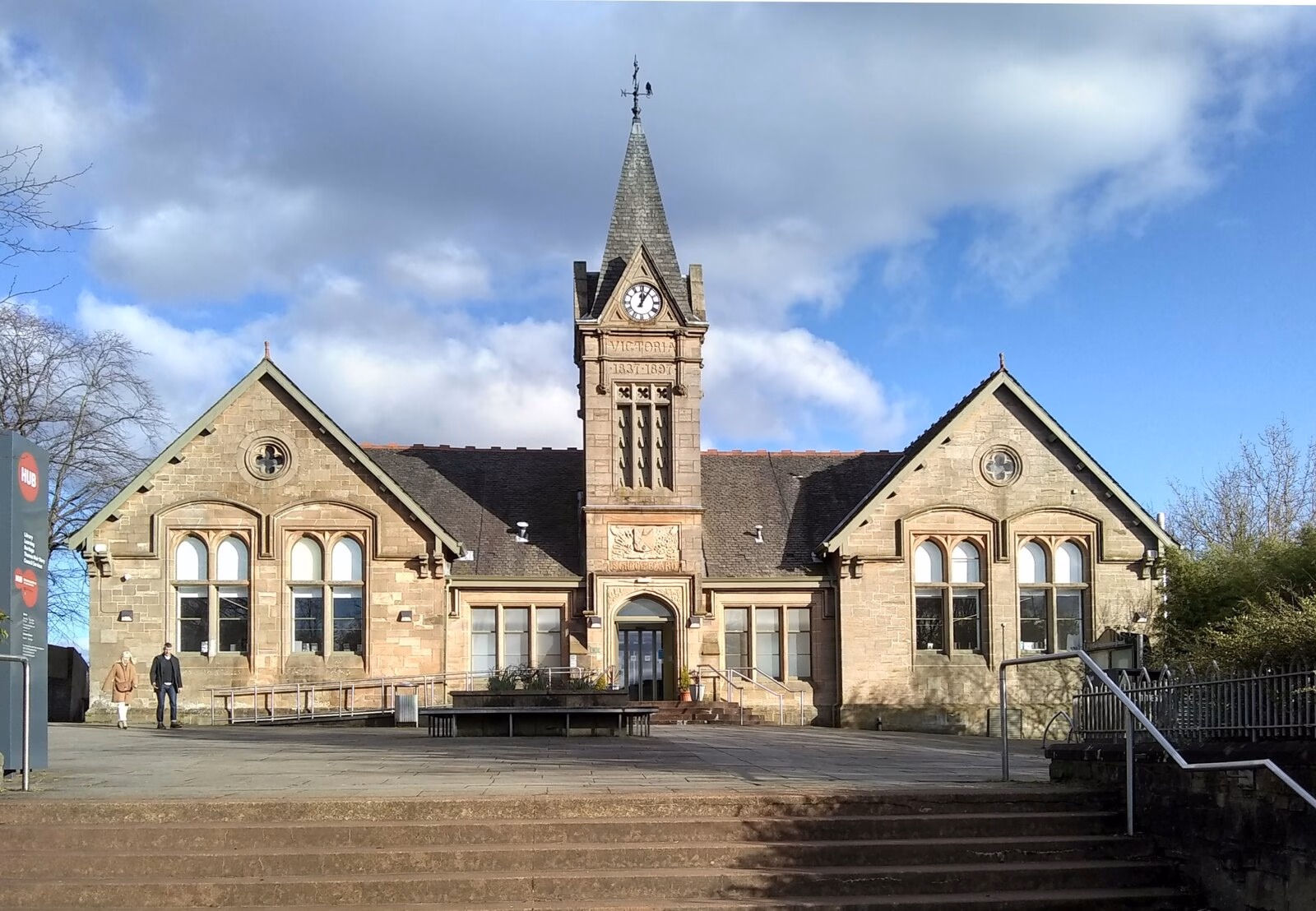 Bishopbriggs Library and Community Hub, a sandstone building with a clock tower