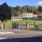 Linn Crematorium in Glasgow, seen past its gates and lawns
