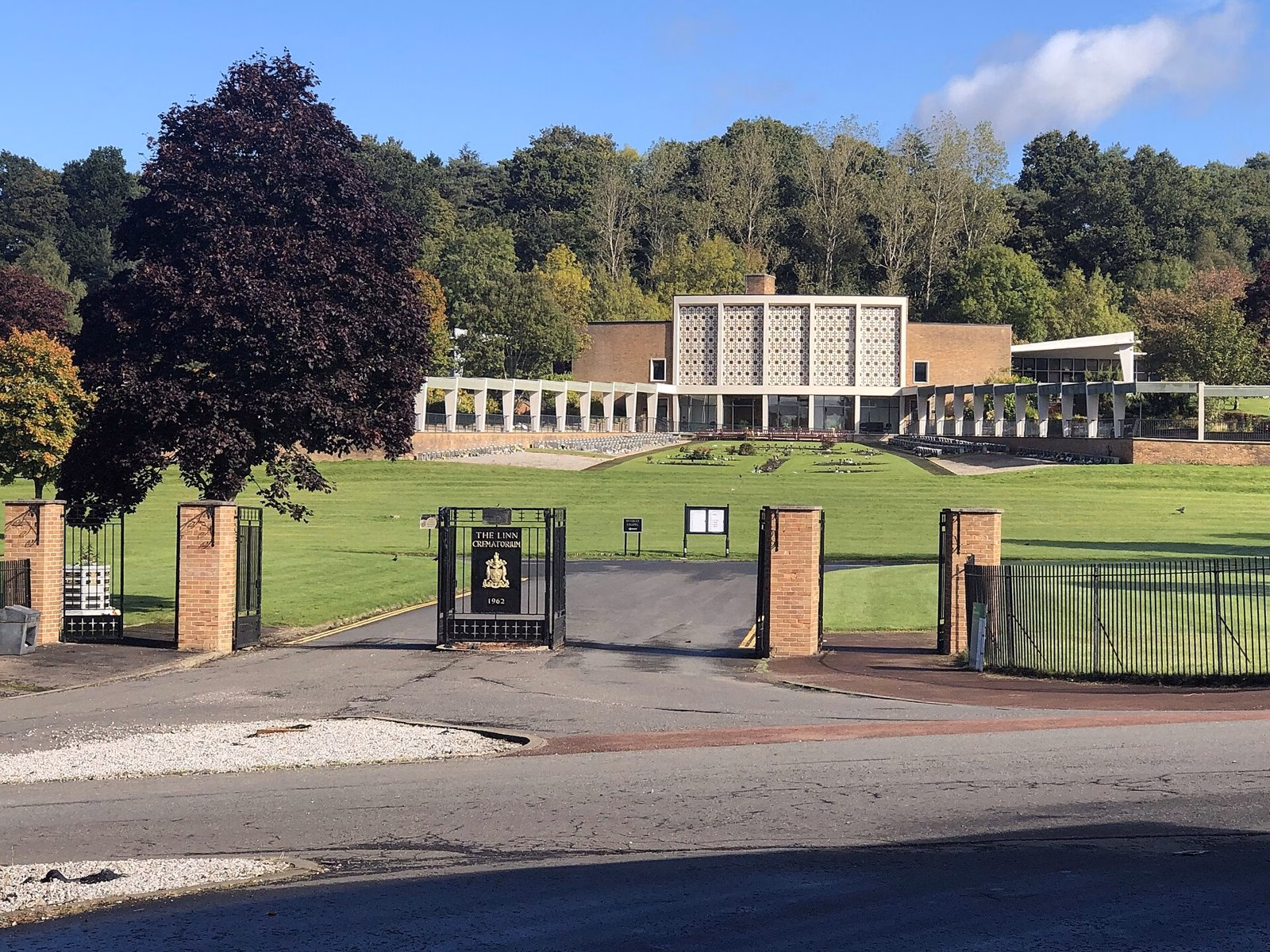 Linn Crematorium in Glasgow, seen past its gates and lawns