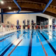 An indoor swimming pool with lane ropes
